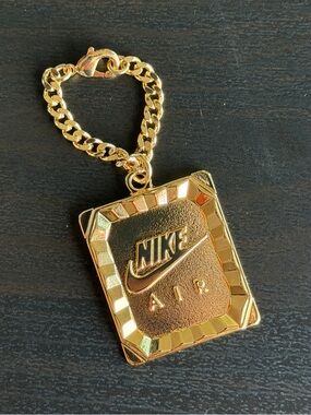 Nike Gold-tone 'Air' Keychain Charm